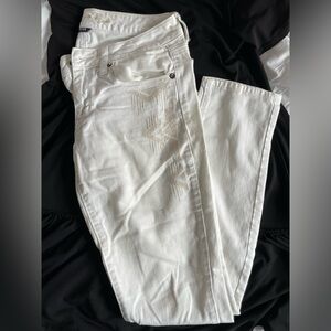 American Eagle white skinny jeans with tribal embroidery